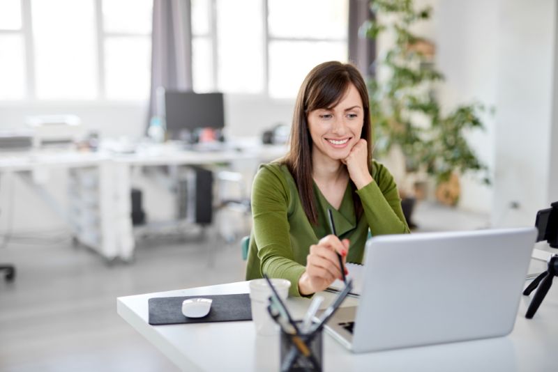 Woman smiling in her office