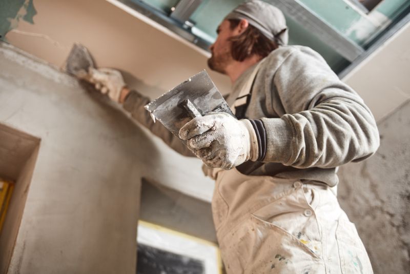 Contractor repairing interior of home